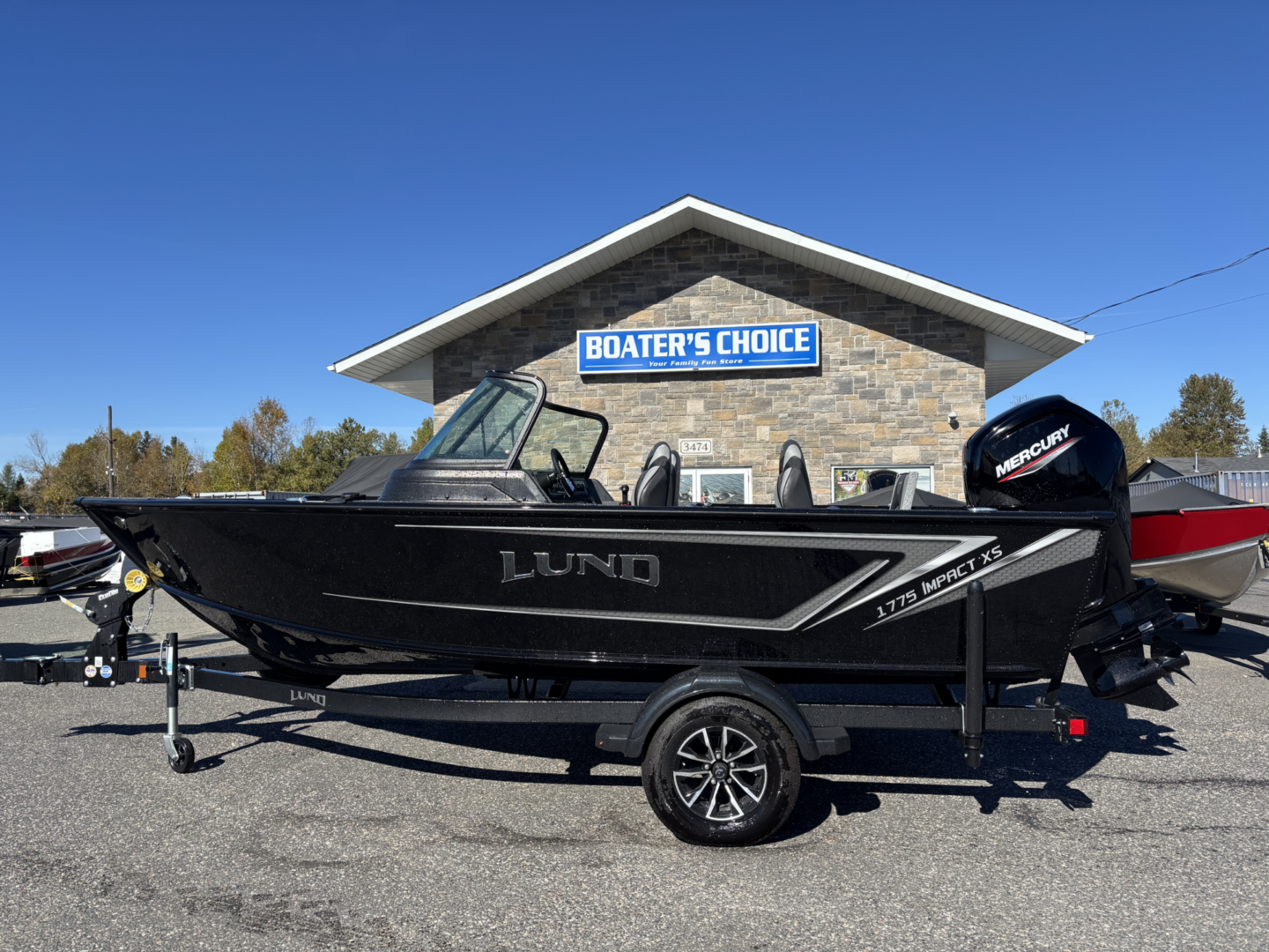 Black Lund fishing boat on trailer outside Boater's Choice.