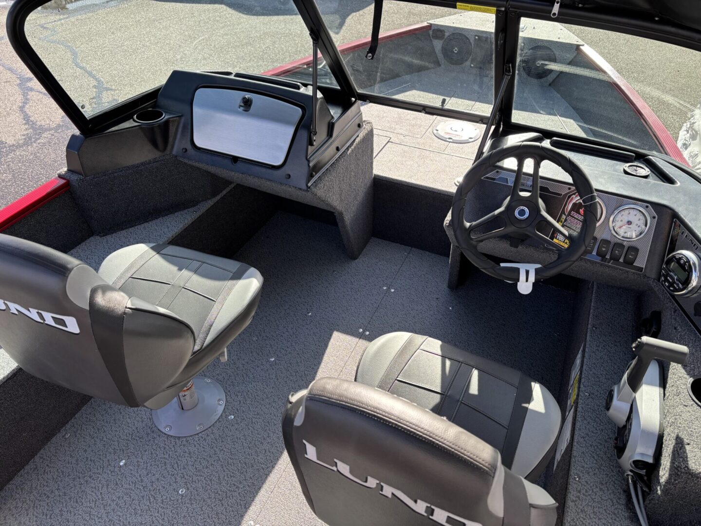 Interior of a modern electric vehicle with sleek seats and a digital dashboard.