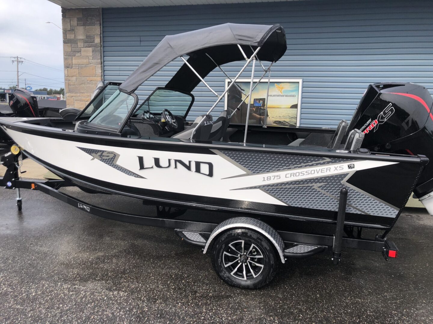 Lund white gray and black boat