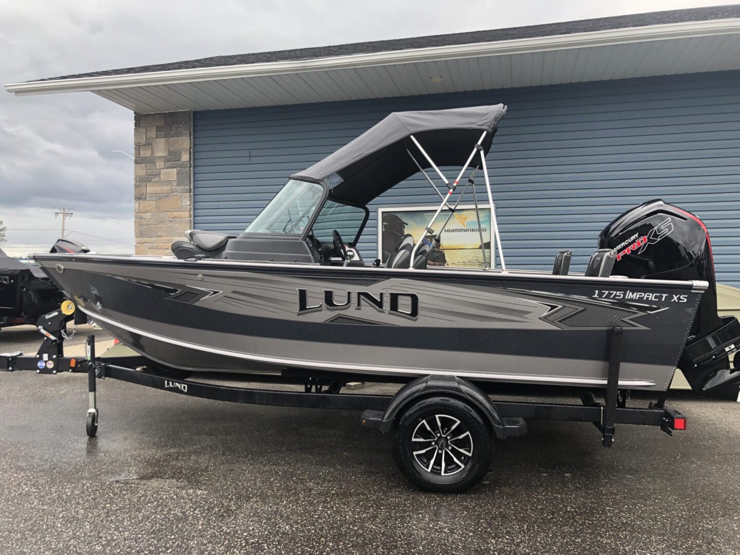 Lund gray and black boat with cover