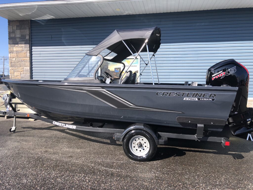 black and silver boat with shade in the sunlight 2