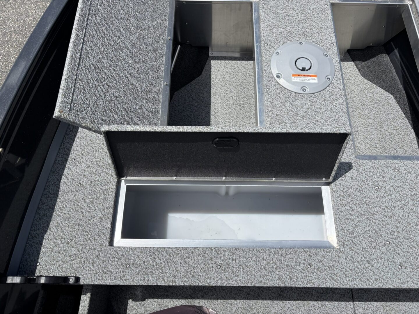 Deck storage bay and front pedestal mount