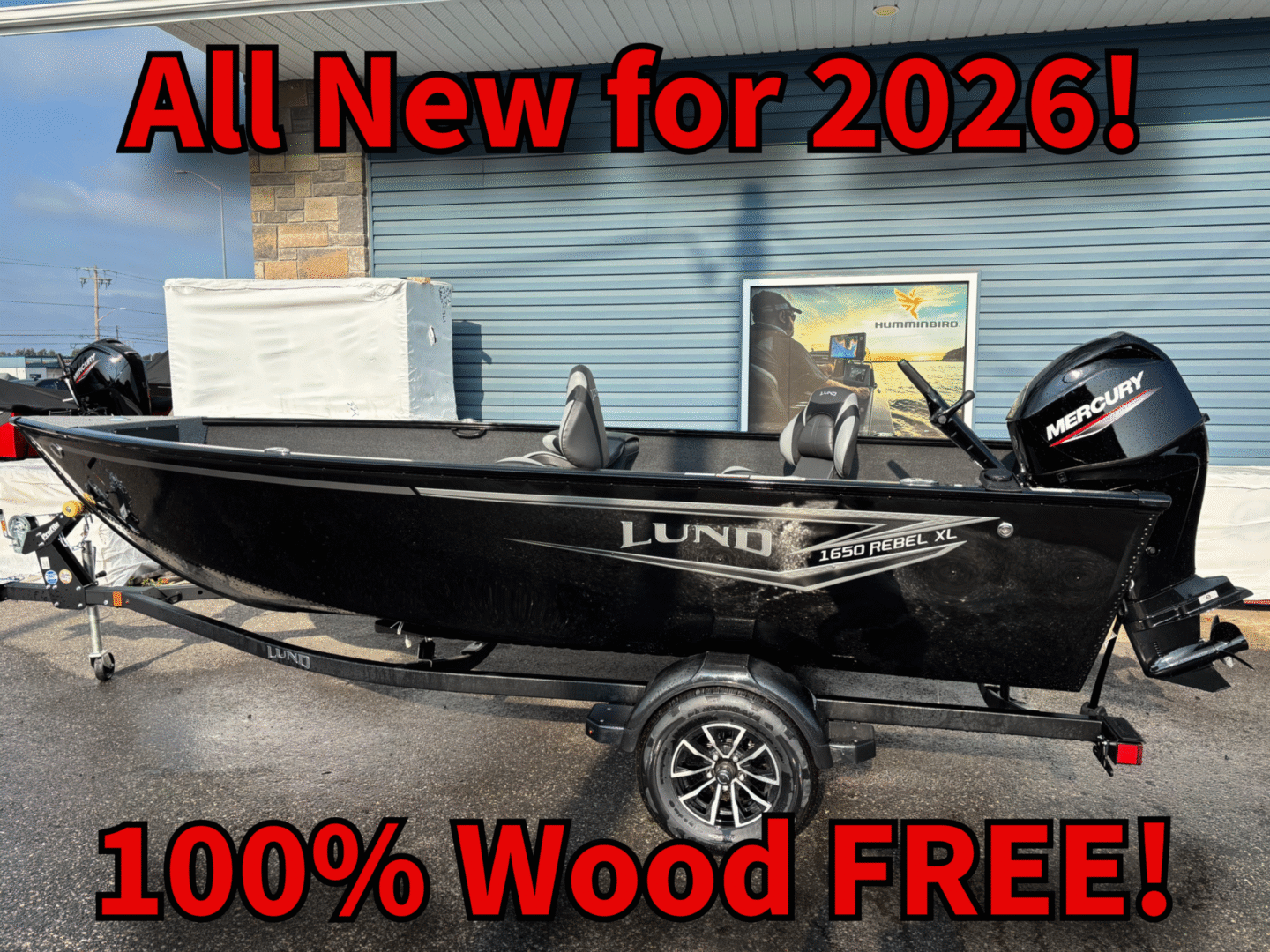 Black Lund fishing boat with trailer, labeled 100% wood-free for 2026.