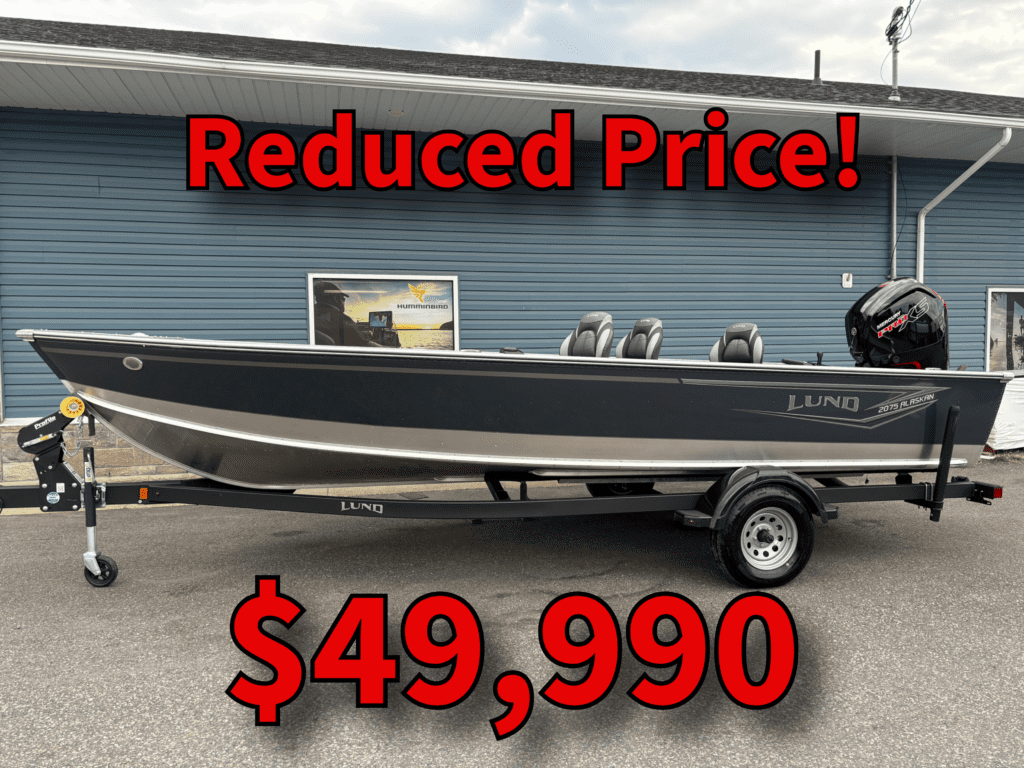 Fishing boat on trailer with a reduced price of $49,990.