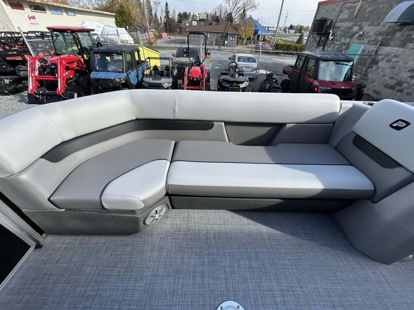 Gray lounge seating and marine speaker