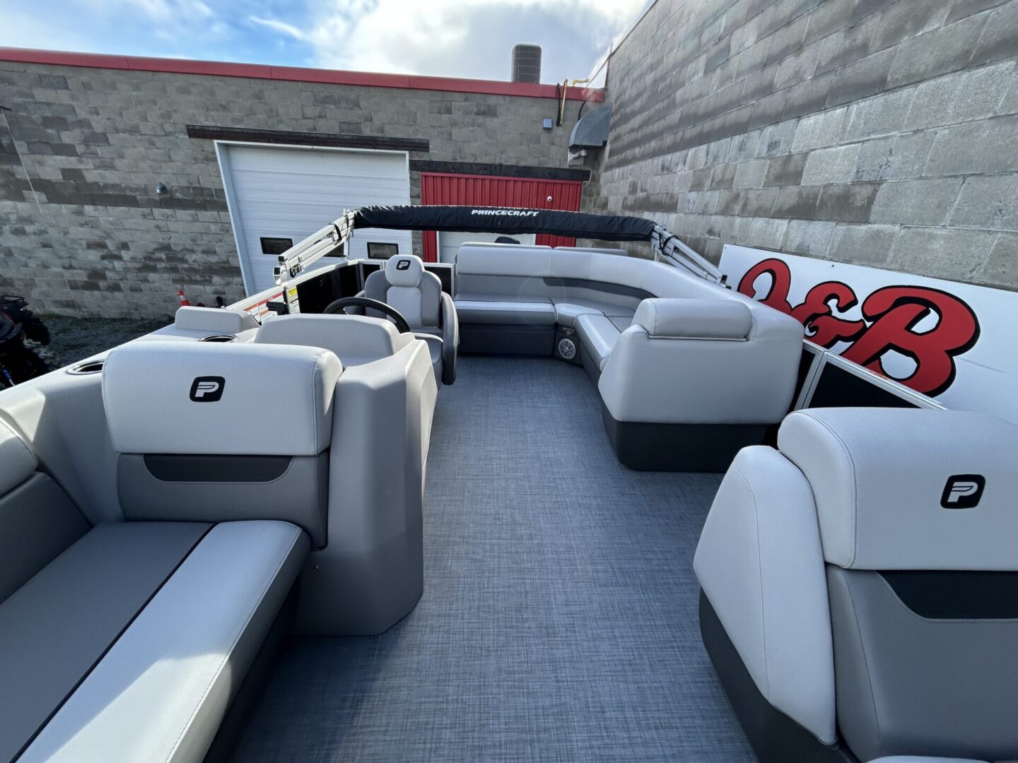 Pontoon interior with forward seating and helm