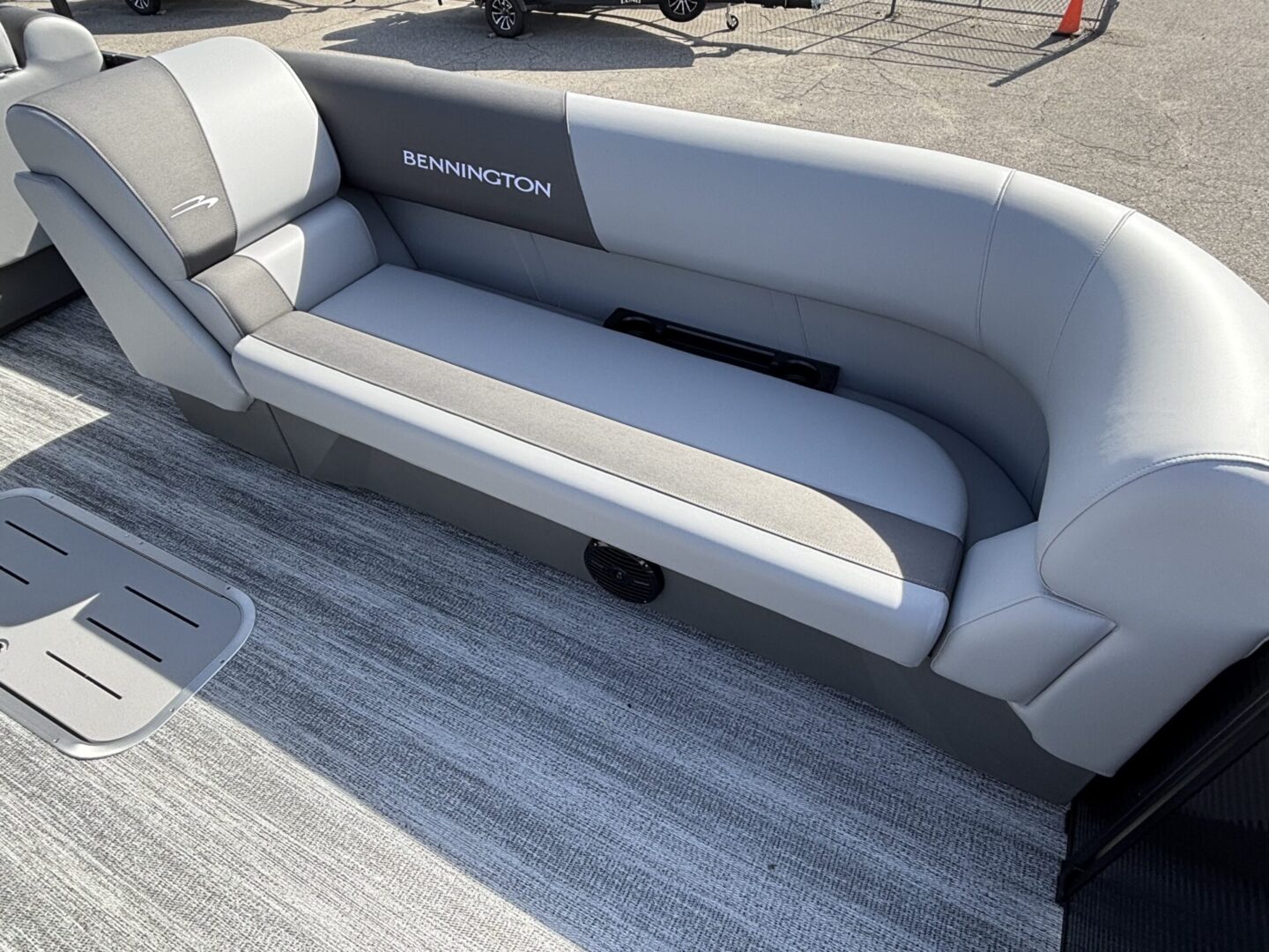 Modern boat seating with a sleek, padded design and neutral colors.