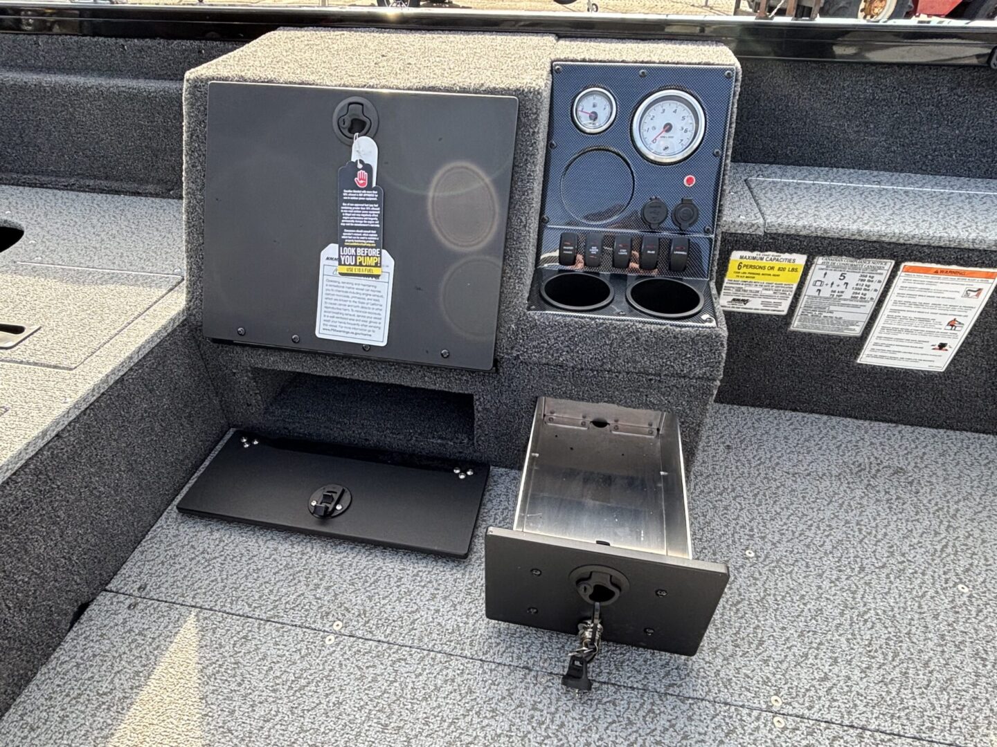 Open safe with electronic lock and control panel.