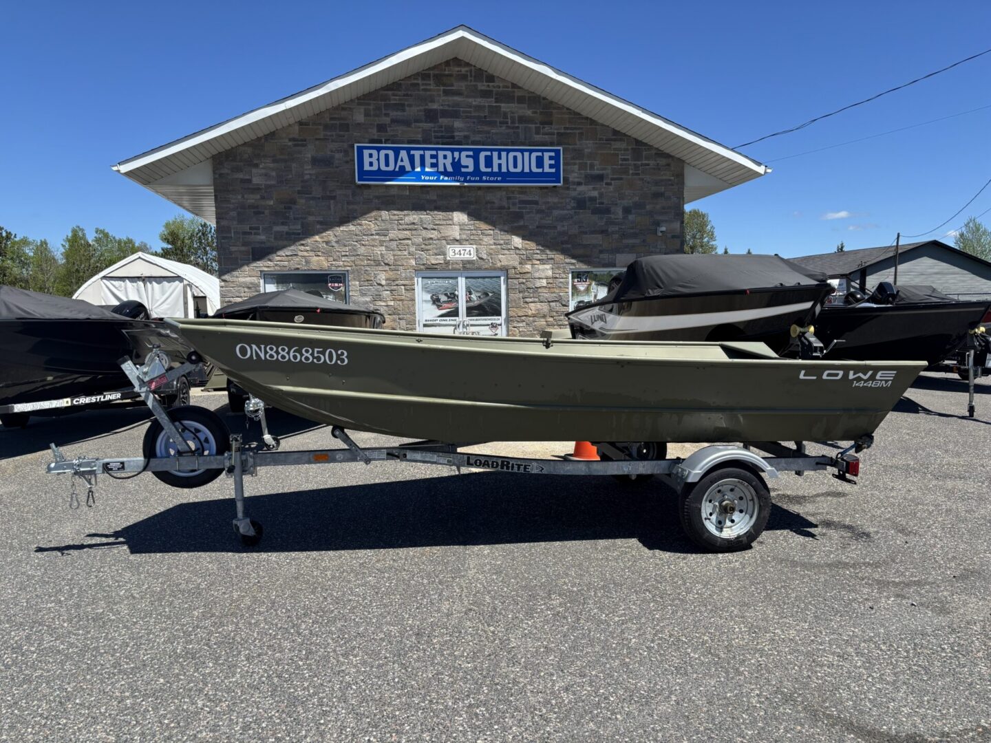Lowe 1448M jon boat on LoadRite trailer