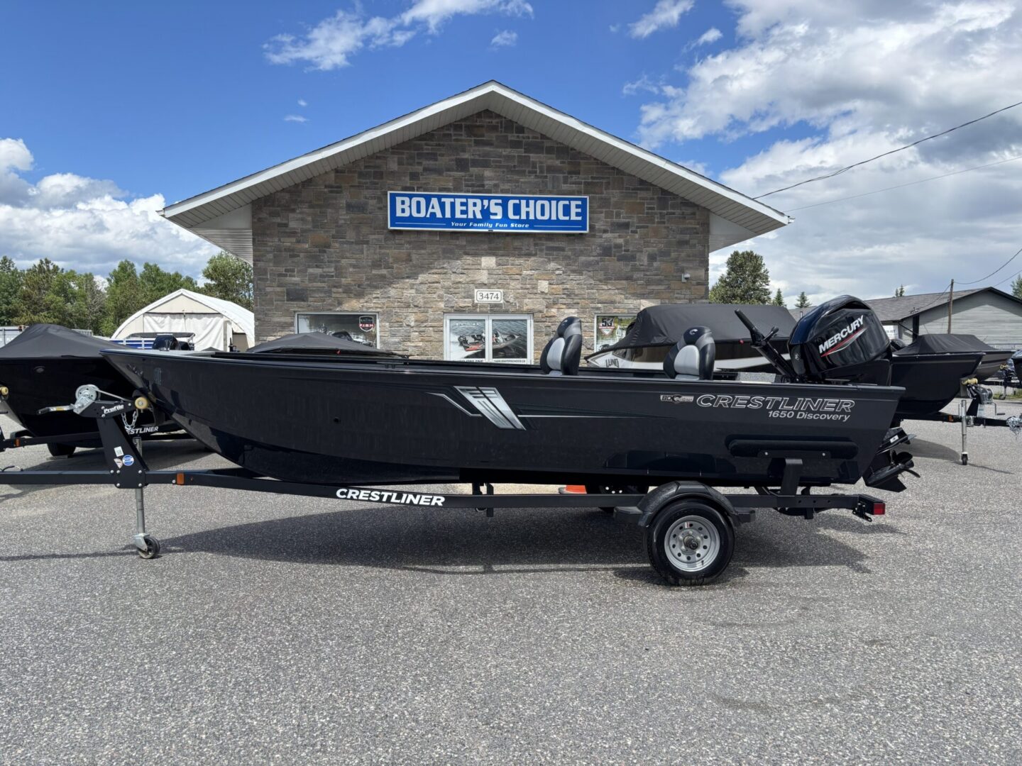 Side profile of Crestliner boat with trailer